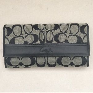 Coach wallet includes checkbook holder